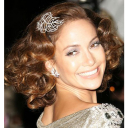 Jennifer Lopez sonriendo para tu teléfono