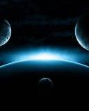 Tres planetas y una luna pequeña