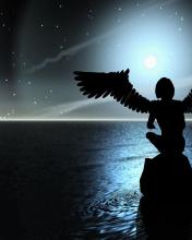 Ángel mirando el mar