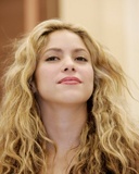 Rostro satisfecho de Shakira
