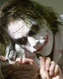 The Joker con su moneda