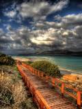 Puente de madera en la playa