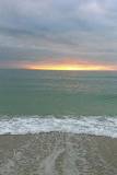 Atardecer en la playa para su celular
